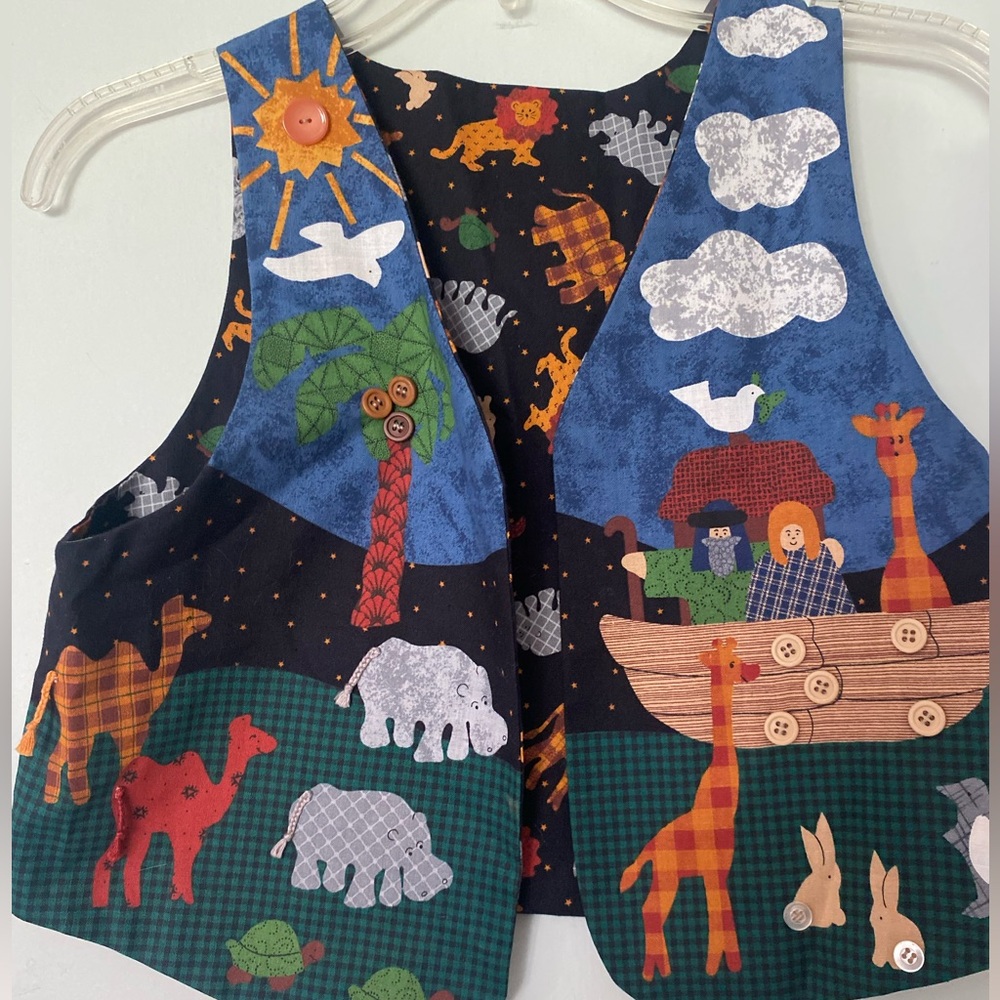 Two cute mommy and me Noah’s ark vest! Hand crafted!